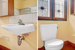 a bathroom with a toilet and a sink and a window at Hotel O 90596 Hotel Griya Astoeti in Bogor +34 photos