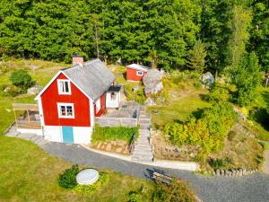 an aerial view of a red and white house at Knaggelid Guest Houses in Svängsta