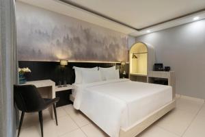 Ένα ή περισσότερα κρεβάτια σε δωμάτιο στο Smart Stays by Country Inn, Tapovan, Rishikesh +6 φωτογραφίες