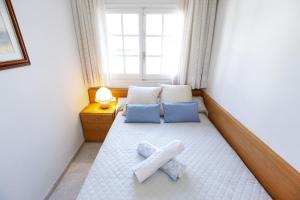 Postel nebo postele na pokoji v ubytování Casa QUEVEDO