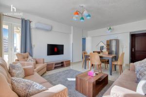 Χώρος καθιστικού στο Host Prime Bright Apartment