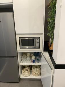 Η κουζίνα ή μικρή κουζίνα στο APARTAMENTo MODERNO CENTRO MADRID - ARGÜELLES-PLAZA ESPAÑA