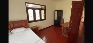 Postel nebo postele na pokoji v ubytování Anaya Guest House