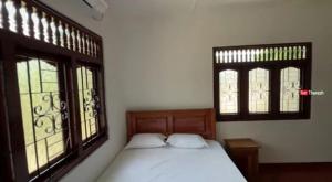 Postel nebo postele na pokoji v ubytování Anaya Guest House