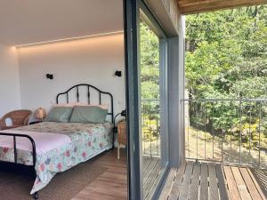 Giường trong phòng chung tại Bungalows da Travanca