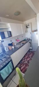 an overhead view of a kitchen with a stove at zpartment in Copiapó