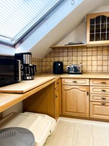 Η κουζίνα ή μικρή κουζίνα στο Golden Oldie Kocherblick ,Retro Charme trifft BohoStyle