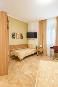 Ένα ή περισσότερα κρεβάτια σε δωμάτιο στο Melannie's Apartment 2