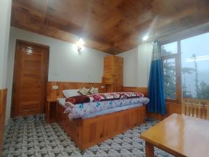 Postel nebo postele na pokoji v ubytování The Nature Villa Kalpa