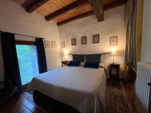 Una cama o camas en una habitación de The Tower in Borgo Fontanini