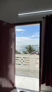 Balkón nebo terasa v ubytování Hotel Paradise Kovalam