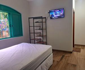 Postel nebo postele na pokoji v ubytování Rancho Cassia - MG - Mãe Maria - Vista Serra da Canastra + 45 fotografií