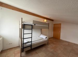 a bedroom with a bunk bed in a room at BigBen Apartments Rust in Rust +43 photos