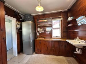 Kuchyň nebo kuchyňský kout v ubytování Traka Cottages + 27 fotografií