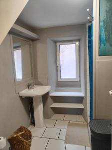 Et badeværelse på Petite maison en pierre