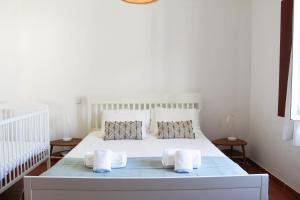 Ένα ή περισσότερα κρεβάτια σε δωμάτιο στο BayHouse +37 φωτογραφίες