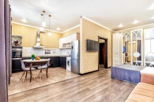 Dapur atau dapur kecil di Однокомнатная студия в ЖК Ирина +12 gambar