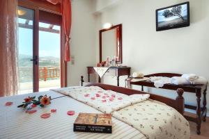 Ένα ή περισσότερα κρεβάτια σε δωμάτιο στο Villa, Triopetra +21 φωτογραφίες