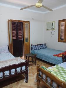 Ένα ή περισσότερα κρεβάτια σε δωμάτιο στο New Alsalam Hotel +13 φωτογραφίες