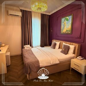 Postel nebo postele na pokoji v ubytování Perla De Mar Hotel Baku