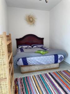 Postel nebo postele na pokoji v ubytování Ocean Jam Surf House