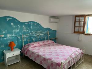 Ένα ή περισσότερα κρεβάτια σε δωμάτιο στο Villa Aquarium