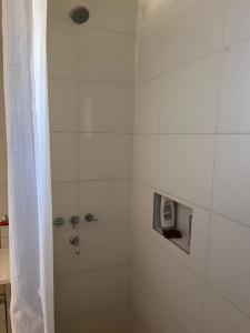 a bathroom with a shower with a scale in it at Santa Lucía in Playa Unión