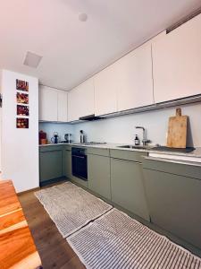 Kuchyň nebo kuchyňský kout v ubytování Peak Apartment - Saas-Fee + 1 fotografie