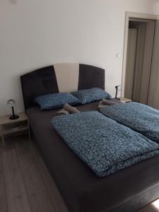Una cama o camas en una habitación de Odmor za umorne