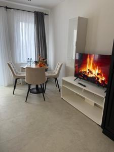 TV a/nebo společenská místnost v ubytování Hotel Sharlota