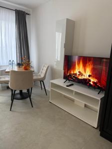 TV a/nebo společenská místnost v ubytování Hotel Sharlota + 8 fotografií