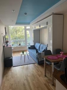 Posezení v ubytování Apartament NIEBO Ustroń + 6 fotografií