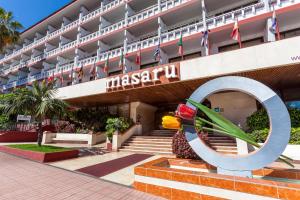 a view of the main building of masdar university at Apartamentos Masaru in Puerto de la Cruz