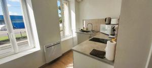 Dapur atau dapur kecil di Le Little Cosy calme et confort