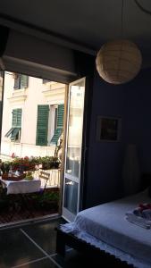 A bed or beds in a room at Il Riposo del Guerriero Guesthouse