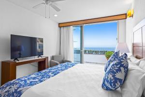 TV a/nebo společenská místnost v ubytování Grand Miramar A601