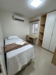 En eller flere senge i et værelse på Seu lar no melhor de Recife 4