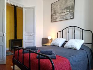 Katil atau katil-katil dalam bilik di Le charme à la française - Appartement 4 pers