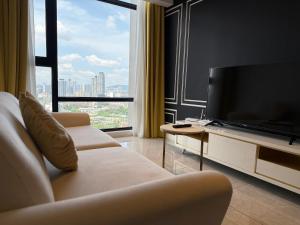 โทรทัศน์และ/หรือระบบความบันเทิงของ Axon Residence Bukit Bintang By Family Sweet