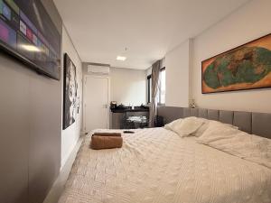 Voodi või voodid majutusasutuse Sauna Restaurante Academia Sinuca 3 min a Pé mar toas +35 fotot