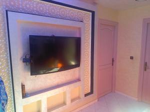 TV a/nebo společenská místnost v ubytování appartement à al tilal