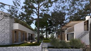 an external view of a building with a tree at VICE VERSA -Seaside boutique Villa with Pool in Punat