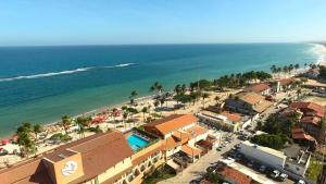 an aerial view of a beach with a resort at Praia do Frances Marechal in Marechal Deodoro