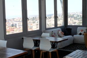 Posezení v ubytování Le Panoramic Boutique Hôtel