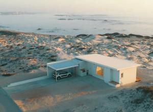 a rendering of a small house on the beach at KaiKaiView in Port Nolloth