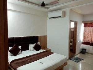 Ένα ή περισσότερα κρεβάτια σε δωμάτιο στο Hotel Nik