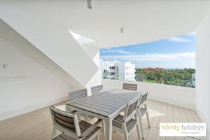 En balkon eller terrasse på Homity Holidays - Playa Granada - Mar de Fabiola + 113 billeder