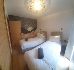 - 2 lits dans une chambre avec 2 lits dans l'établissement NEW APT, 100m from ski lift, à Châtel