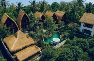 an aerial view of a resort with a swimming pool at Corabelle Gili Air in Gili Air