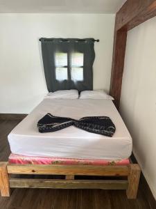 Postel nebo postele na pokoji v ubytování Cantina Indio Twostories Front BeacHouse + 16 fotografií